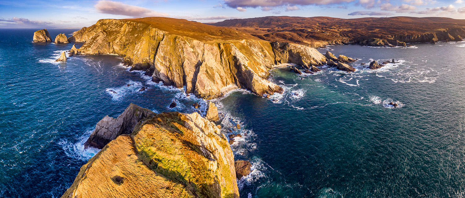 A stunning and rocky coastline view of the abandoned 'famine village' known as Port near Glencolmcille in County Donegal, Ireland.