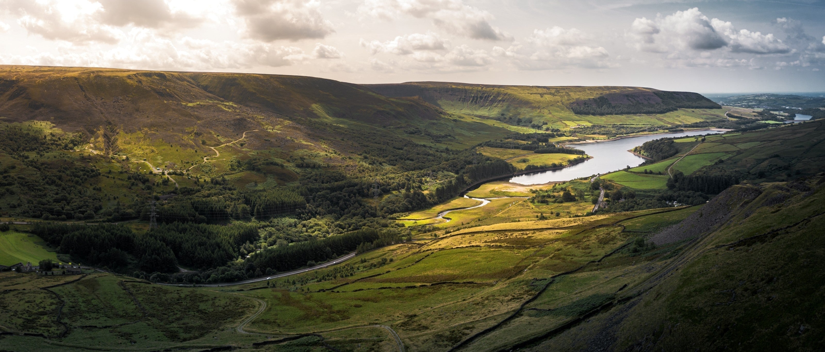 Aerial panorama of Woodhead and Torside reservoirs in the Peak District National Park.