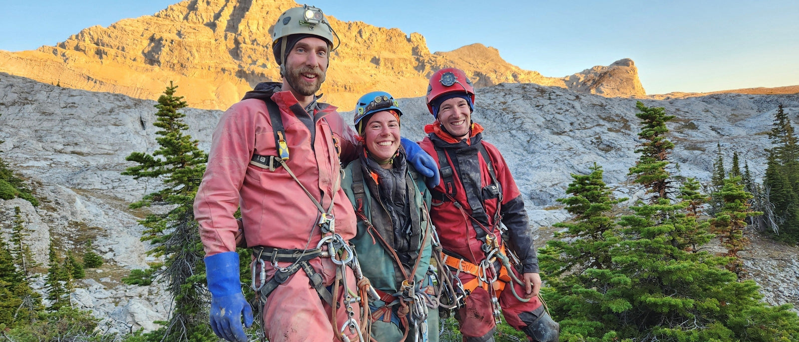 Members of the Bisaro expedition celebrate in the Rockies after successfully completing a through-trip of the complex cave system.