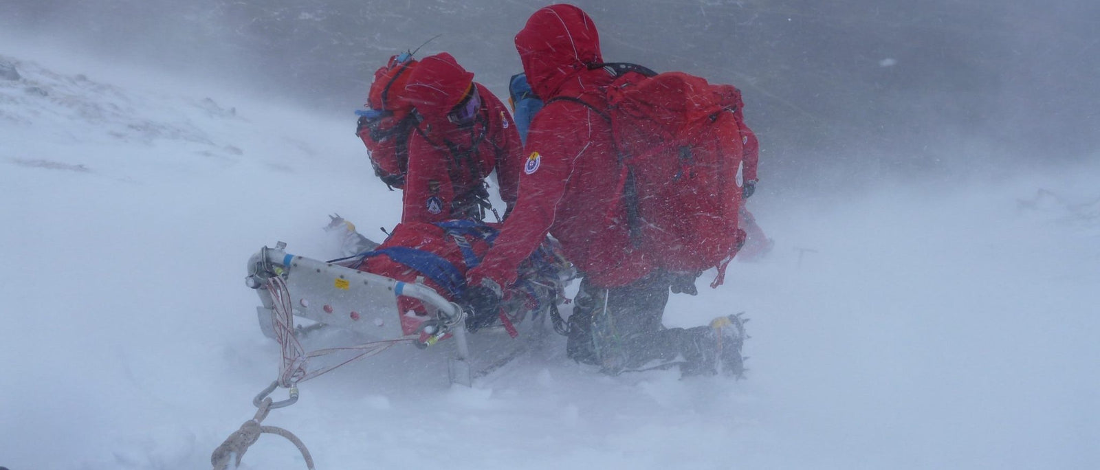 Tweed Valley Mountain Rescue Team carrying out a difficult stretcher rescue in the teeth of a storm. Photo by Steve Penny courtesy of Tweed Valley MRT.
