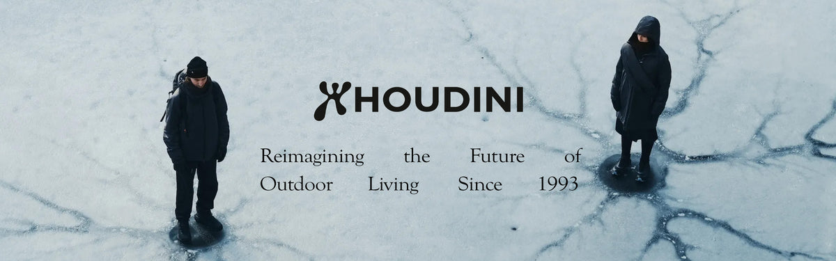 Houdini brand banner with two people on snowy ground and tagline 'Reimagining the Future of Outdoor Living Since 1993'
