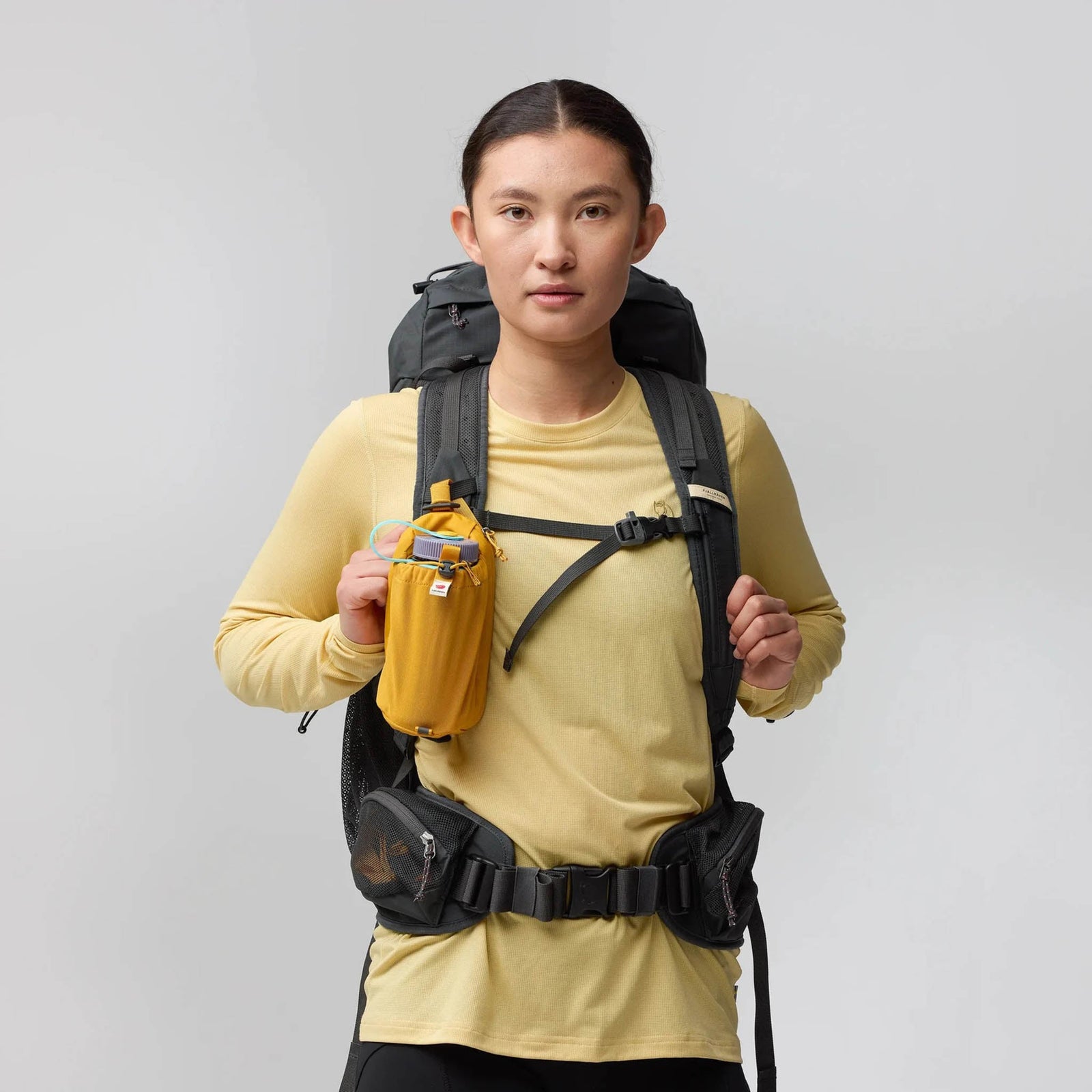 Abisko Bottle Pocket Fjällräven F23100177-161 Backpack Accessories One Size / Mustard Yellow
