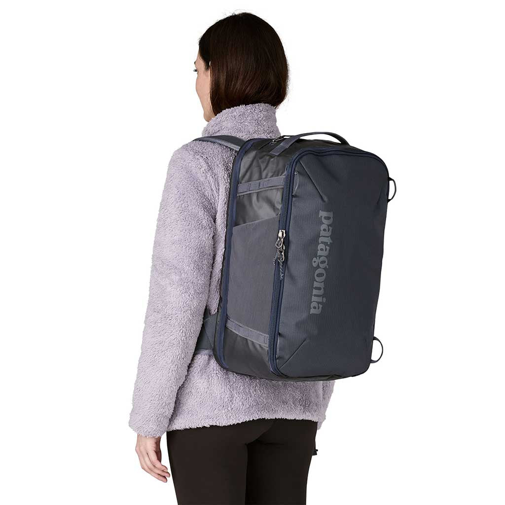 patagonia black hole 25l daypack smolder blue Hole Pack Worn Wear A padded sleeve inside holds most 15 laptops and a zippered mesh pocket is ideal for stashing smaller items Patagonia Best 25l Backpack 25l